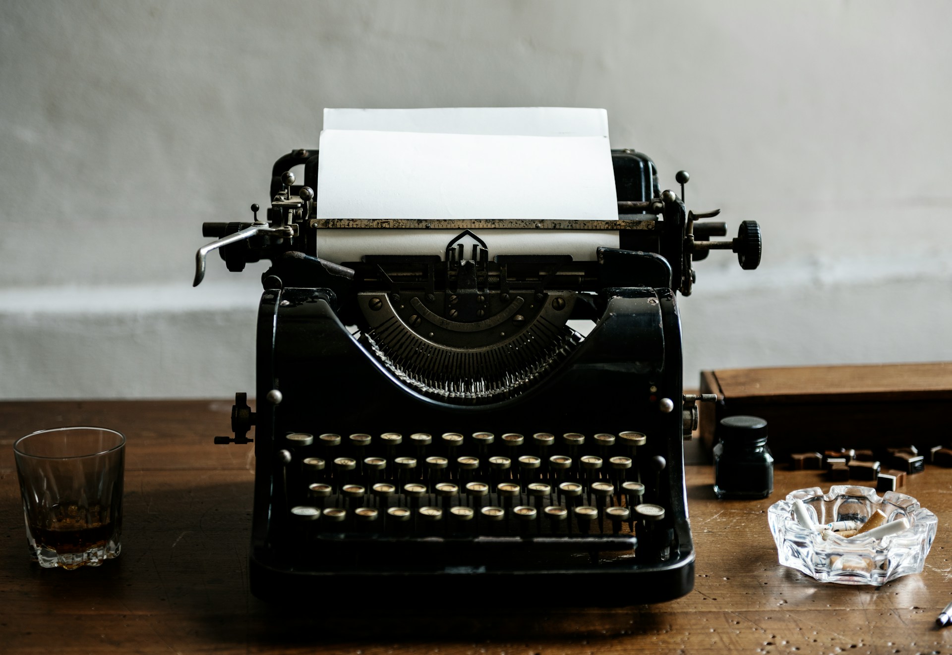 A typewriter on a desk.